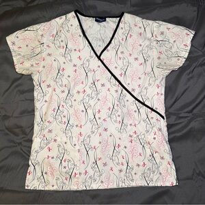 Women's  breast cancer awareness scrub top.